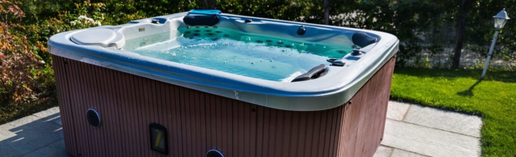 An unused hot tub ready for removal by Hagen's Junk in Northern Colorado